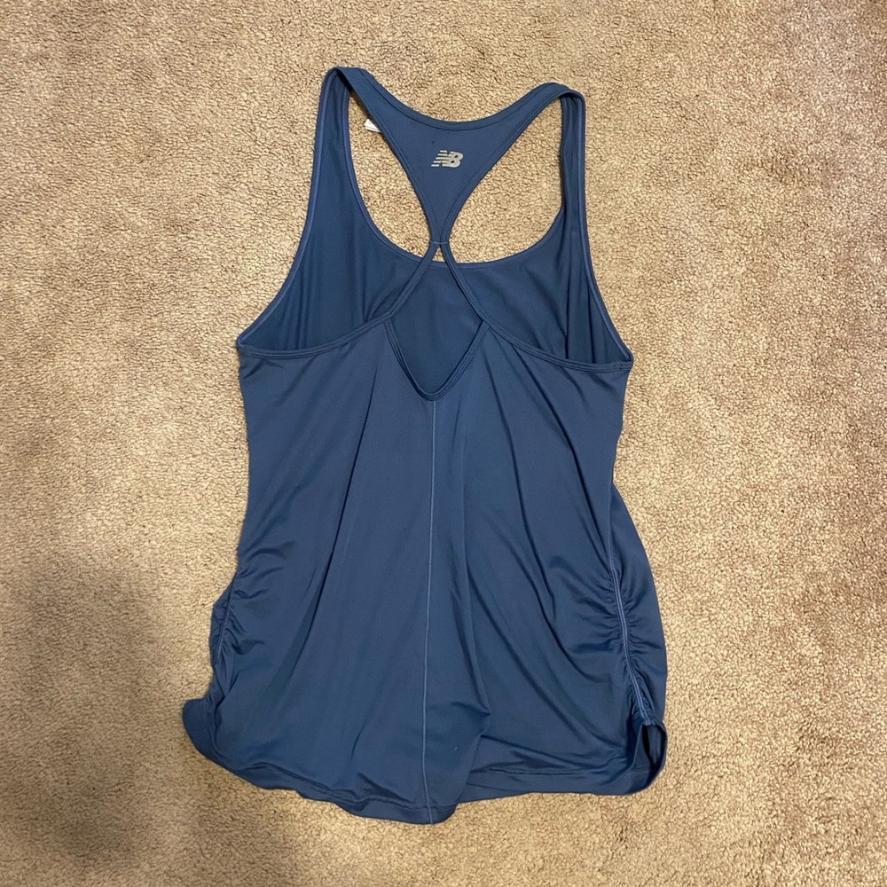 Athletic razor back navy tank top with back cut out and ruched sides